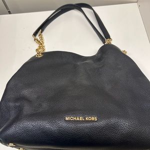 Michael Kors medium black purse.